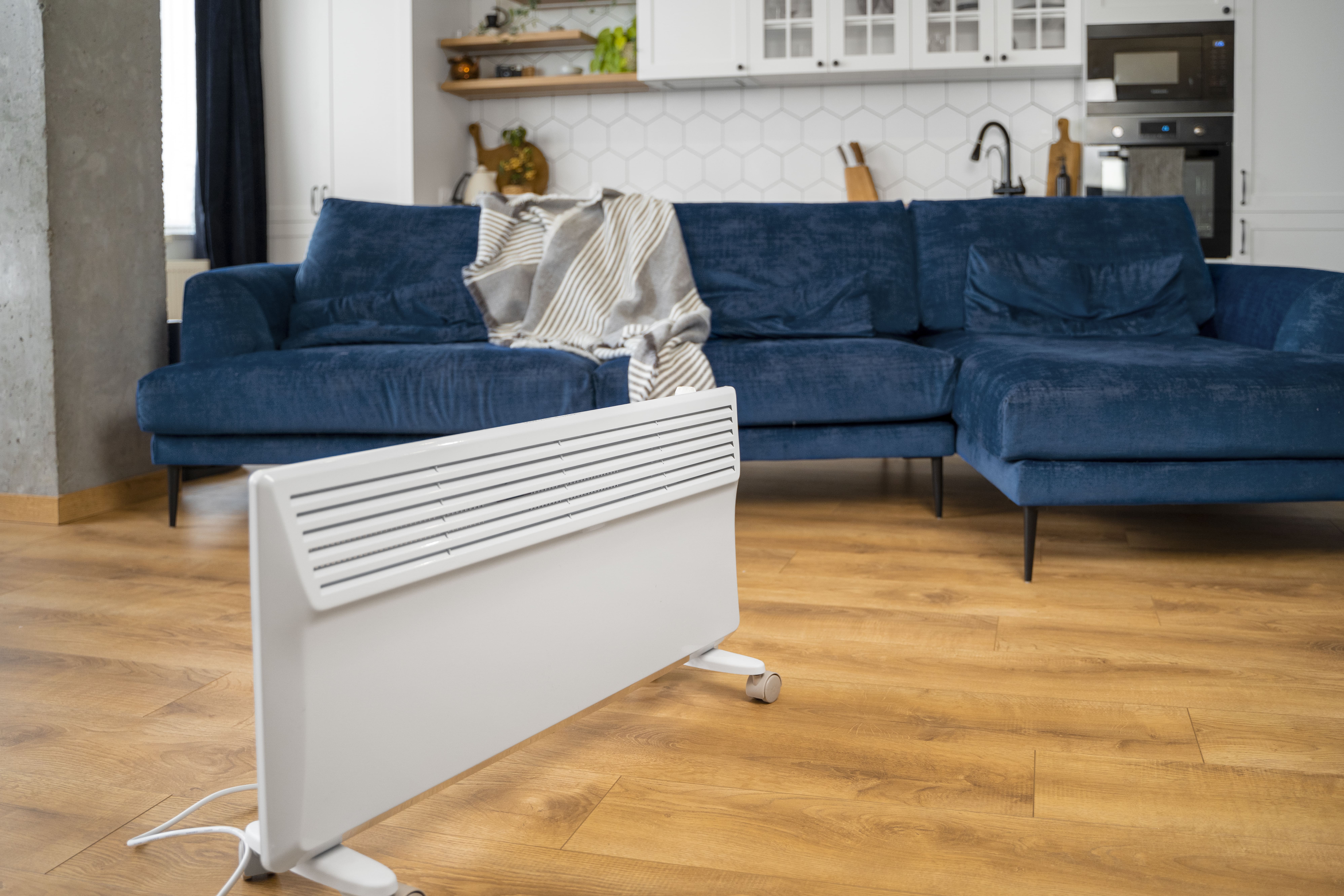 Cozy indoor decoration with heater and warm blanket